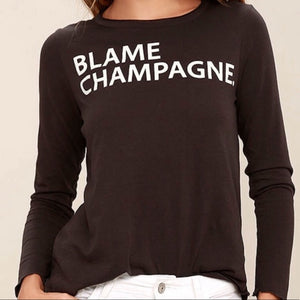 BLAME CHAMPAGNE